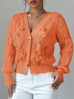 Cozy and casual cable-knit cardigan with 3D bow detail