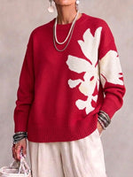 Oversized, Loose-fit, Casual Sweater With A Large, Color-block Floral Design.