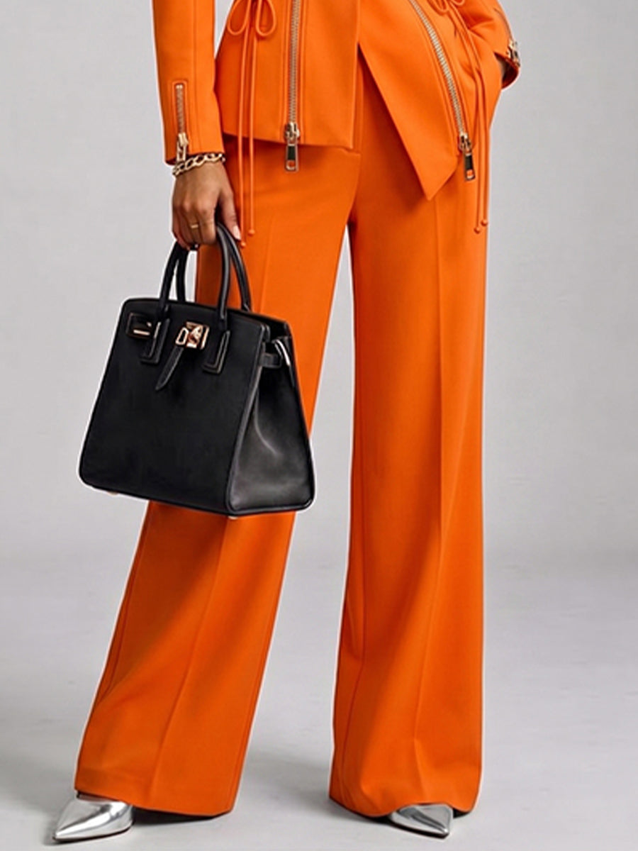 Stylish Orange Trousers With A Sharp Cut
