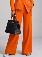 Stylish Orange Trousers With A Sharp Cut