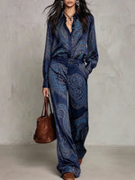 Two-piece Set Featuring A Satin Shirt And Trousers With A Vintage Paisley Print.