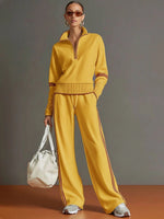 Casual Two-piece Set Featuring A Half-zip Cotton Sweatshirt And Pants With Color-block Piping.