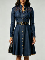 Elegant And Refined Patchwork Denim Dress With Lace And Button Details.