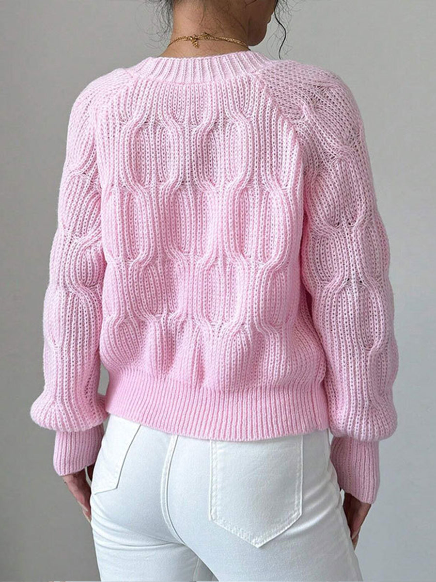 Cozy and casual cable-knit cardigan with 3D bow detail