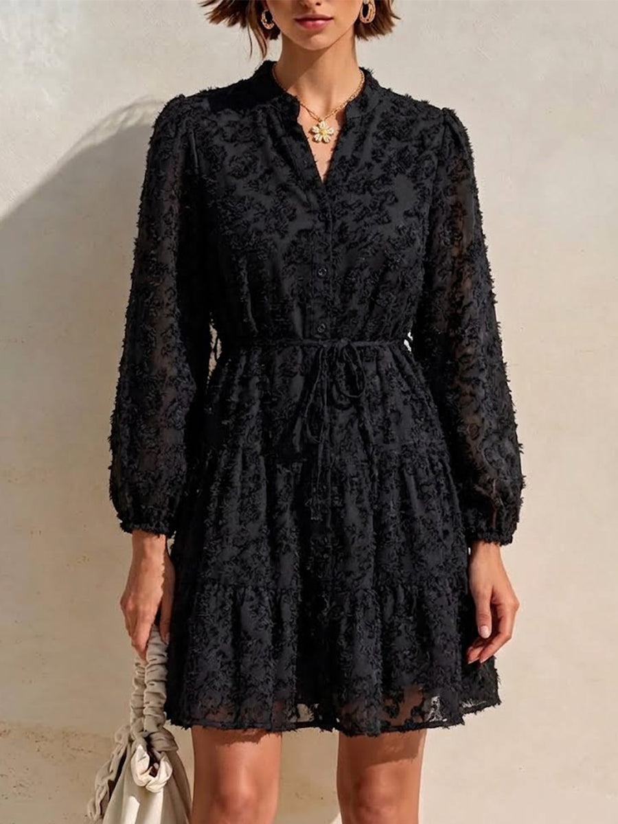 Long-sleeve, Short Dress Featuring A V-neck, Partial Button Placket, Tie-waist, And Ruffled Hem, Crafted From Jacquard Fabric With A Cut-out Floral Design