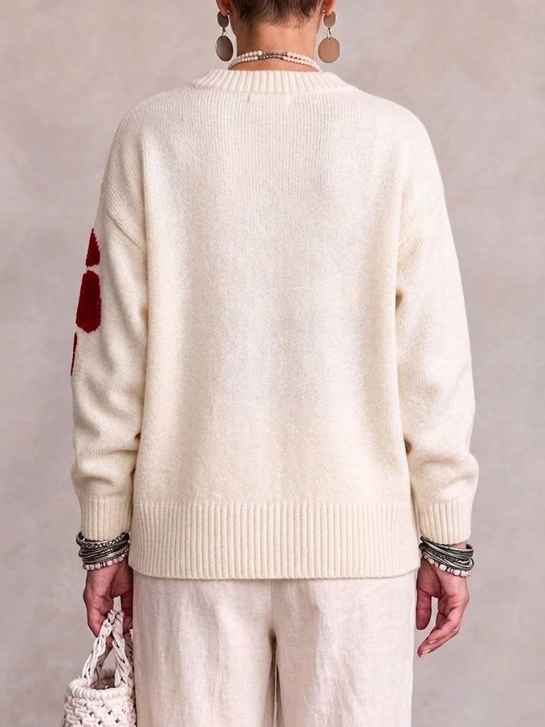 Oversized, Loose-fit, Casual Sweater With A Large, Color-block Floral Design.