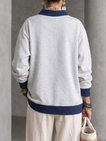 Loose-fit Long-sleeve Sweatshirt With A Crew Neck And Contrasting Polka-dot Pattern