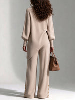 Two-piece Set Featuring A Comfortable Ribbed Knit Top With An Asymmetrical Hem And Matching Pants