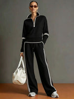 Casual Two-piece Set Featuring A Half-zip Cotton Sweatshirt And Pants With Color-block Piping.