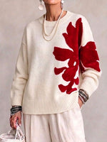 Oversized, Loose-fit, Casual Sweater With A Large, Color-block Floral Design.