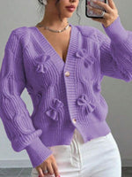 Cozy and casual cable-knit cardigan with 3D bow detail
