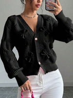 Cozy and casual cable-knit cardigan with 3D bow detail