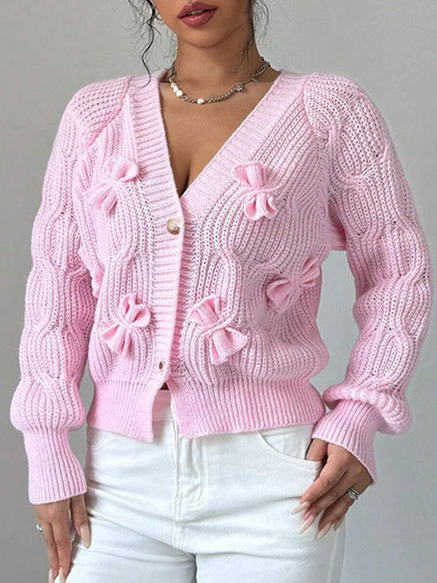 Cozy and casual cable-knit cardigan with 3D bow detail