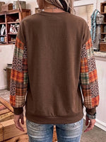 Halloween Crewneck Sweatshirt With Pumpkin Print, Plaid, And Leopard Print Sleeves