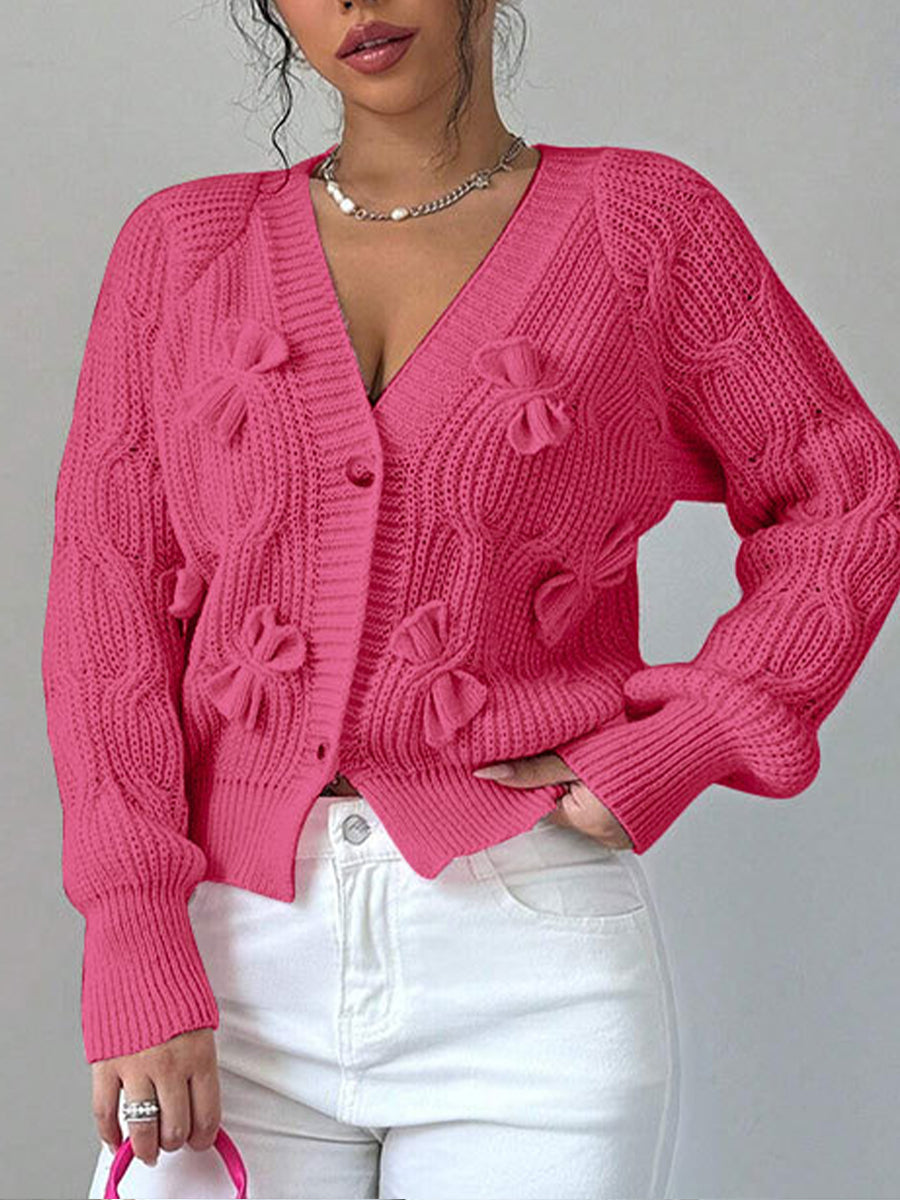 Cozy and casual cable-knit cardigan with 3D bow detail