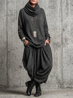 Two-piece Set Featuring A Pinstriped, Drop-shoulder Top With A Gathered High Neck And Harem-style Lantern Pants.
